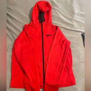 Red Nike Dry fit hoodie.